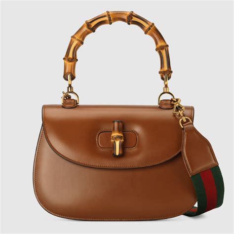 gucci bamboo handled bag|Gucci bamboo bag harper's.